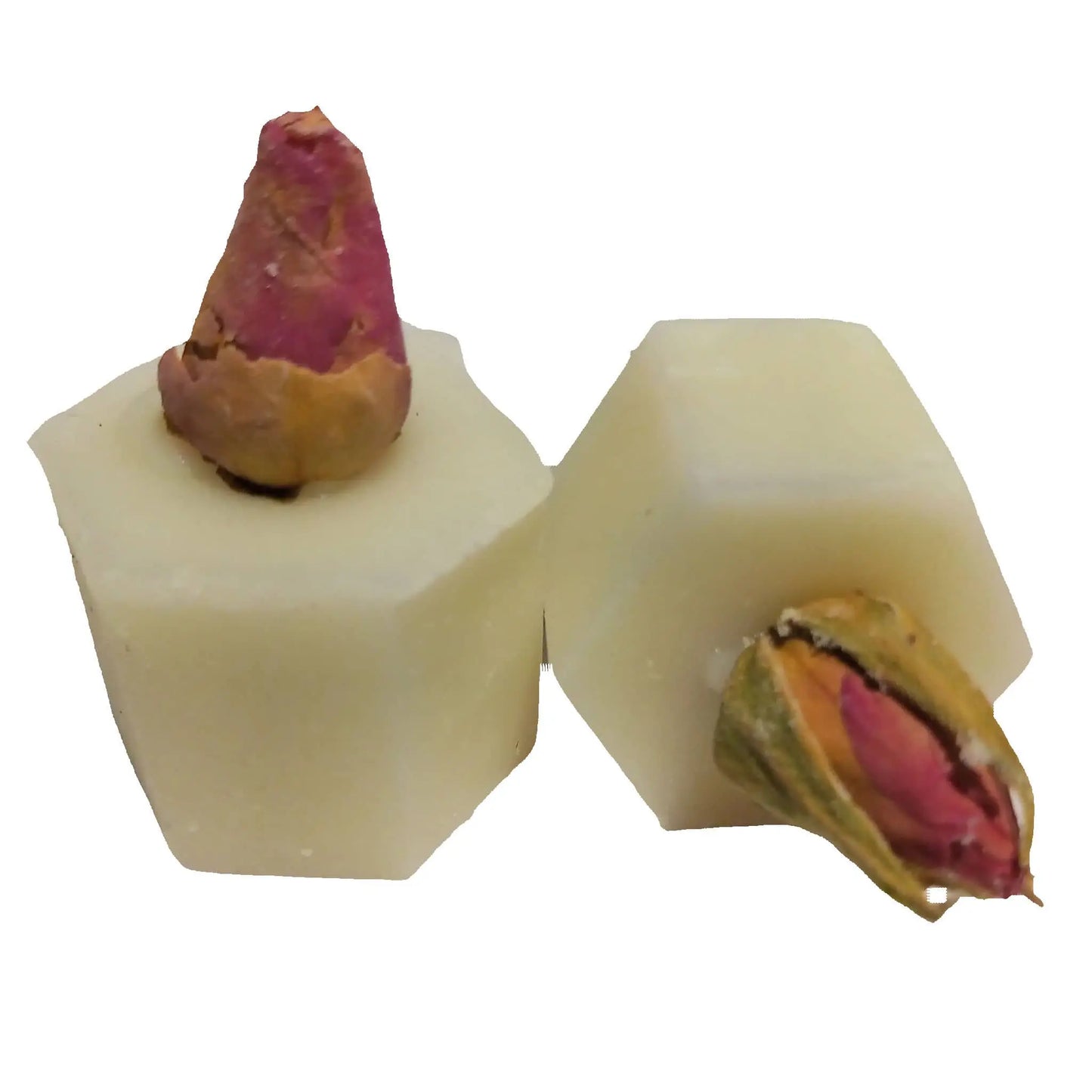 Two white hexagonal squares with pink Damask Rose buds and greenish-brown sepals on top are crafted from Botanical Butter, reminiscent of a delicate bath melt. Product: Damask Rose Botanical Butter Bath Melt by Posh Brats.