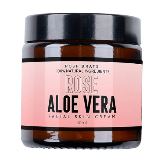 The Rose Aloe Vera Skin Cream by Posh Brats, featuring a brown jar with a black lid and pink label, contains 100% natural ingredients that promise a radiant complexion and anti-inflammatory benefits for glowing skin in its 50ml jar.