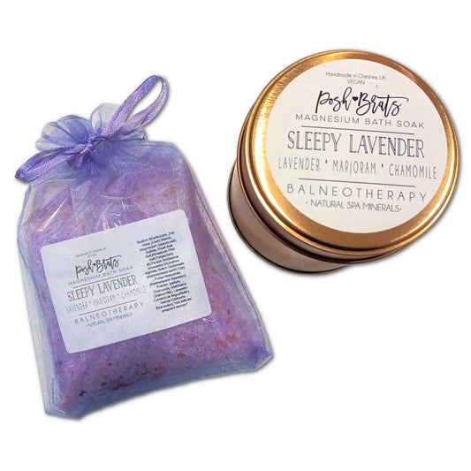The Sleepy Lavender Botanical Bath Salt by Posh Brats is a lavender bath soak with essential oil, Epsom salt, marjoram, and chamomile. Packaged in a purple drawstring bag with a matching tin, its made in Cheshire, UK.