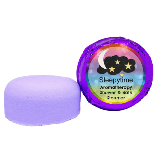 Wrapped in purple foil, the Sleepytime Aromatherapy Shower Steamer by Posh Brats is infused with lavender and chamomile. The label features a cloud and stars design, emphasizing its natural essential oils for restful relaxation.