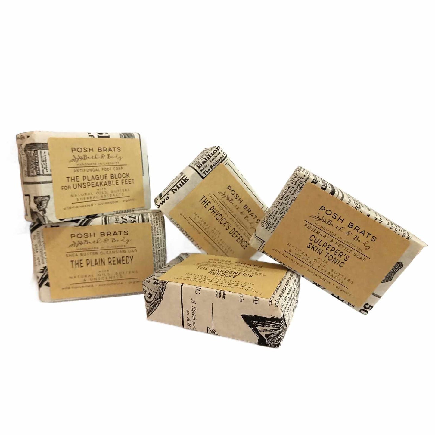 Five bars of soap in brown packaging with text on a white background
