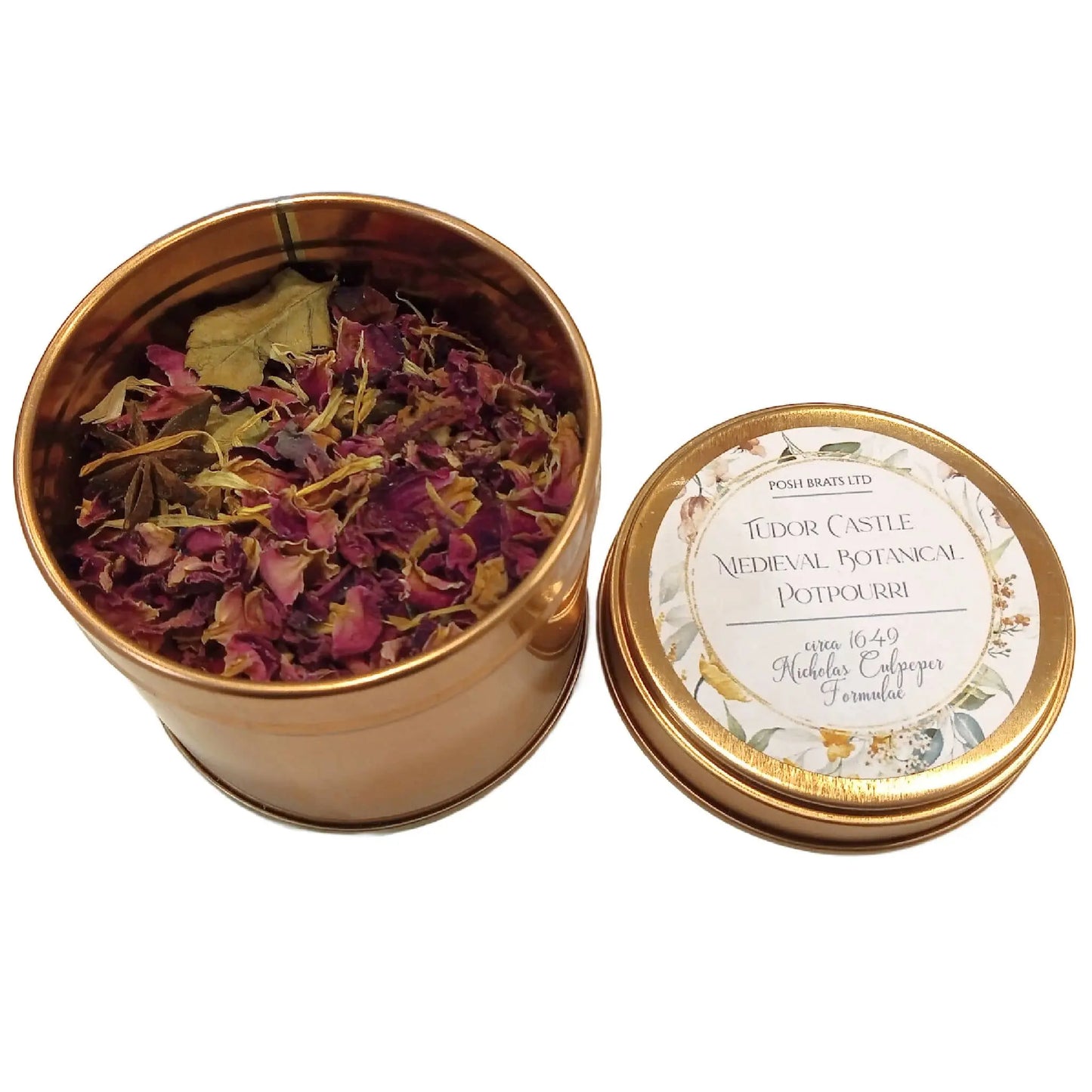 Open the gold tin of Posh Brats Wildcraft Botanical Potpourri, revealing an exquisite blend of dried flowers and herbs. This historical fragrance captivates with its timeless charm and aromatic allure.