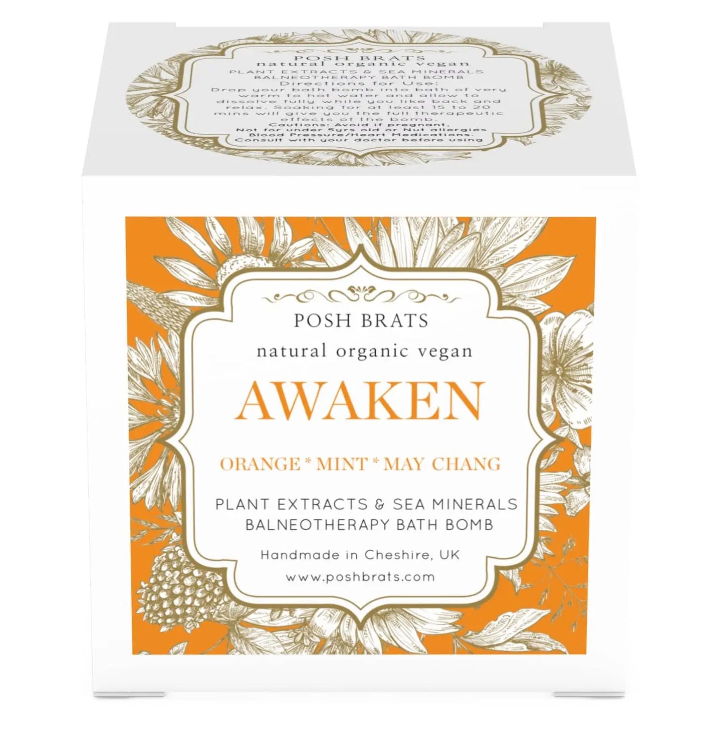 Posh Brats Awaken Aromatherapy Bath Bomb packaging, made in Cheshire, UK, promises a rejuvenating bath with orange, mint, and may chang essential oils. The box has floral designs on an orange and white background and is labeled natural, organic, and vegan.