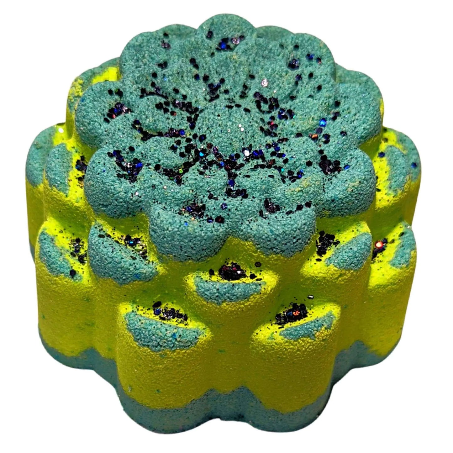 Discover Posh Brats Aloha Paradise Fizzy Bath Bomb with its blue and yellow flower shape and scalloped edges. Infused with essential oils for a tropical escape, it features glitter for a sparkling, textured surface.