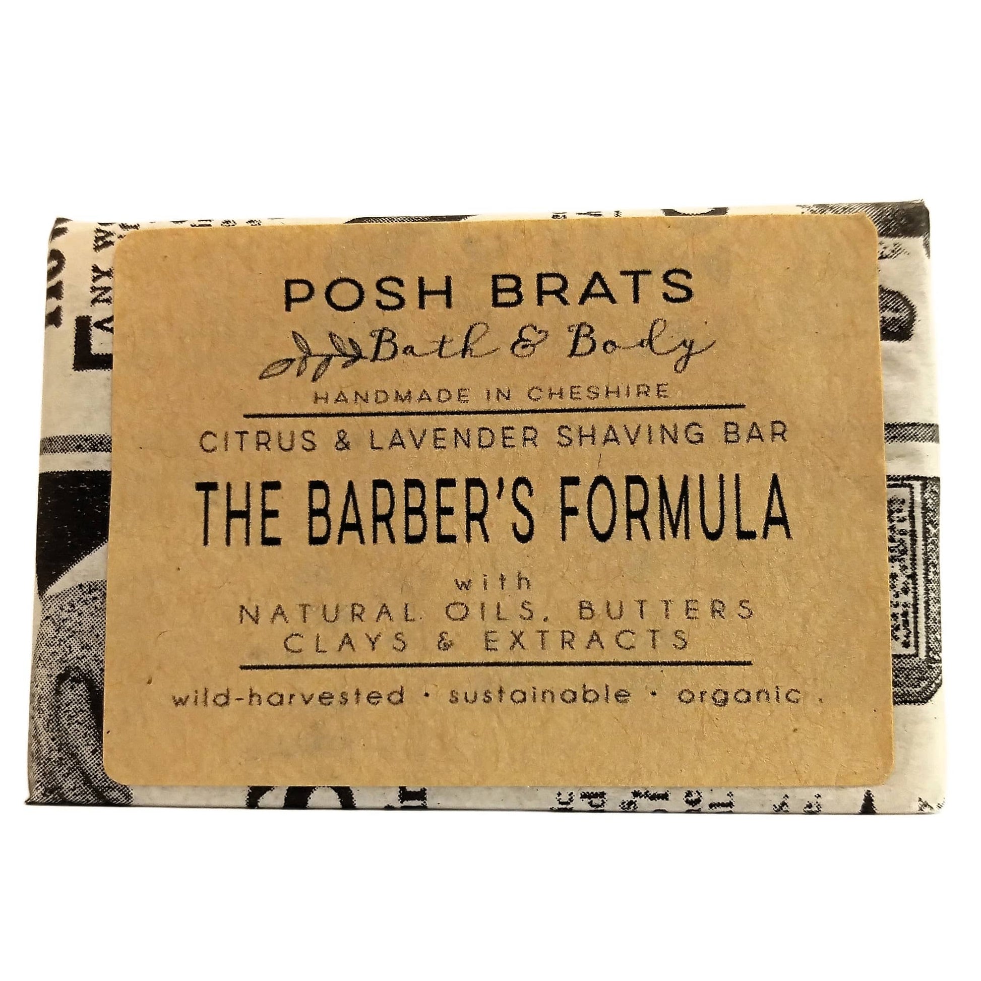Bar of soap with 'Posh Brats Bath & Body' label on a white background