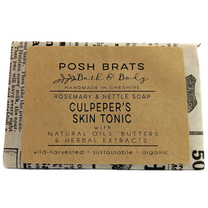 Bar of soap with a 'Posh Brats Bath & Body' label on a white background