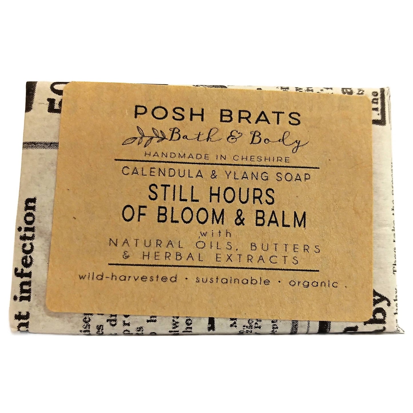 Soap bar with a brown label featuring 'Posh Brats Bath & Body' on a white background