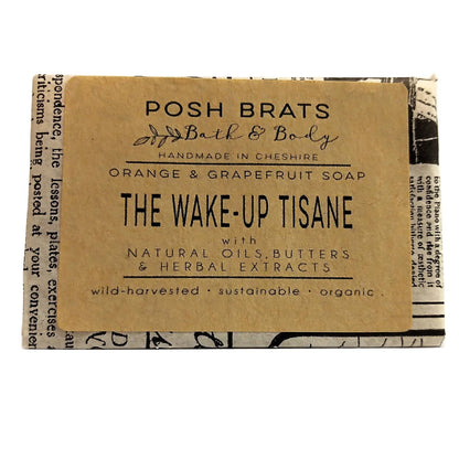 Bar of soap with 'Posh Brats Bath & Body' packaging on a white background
